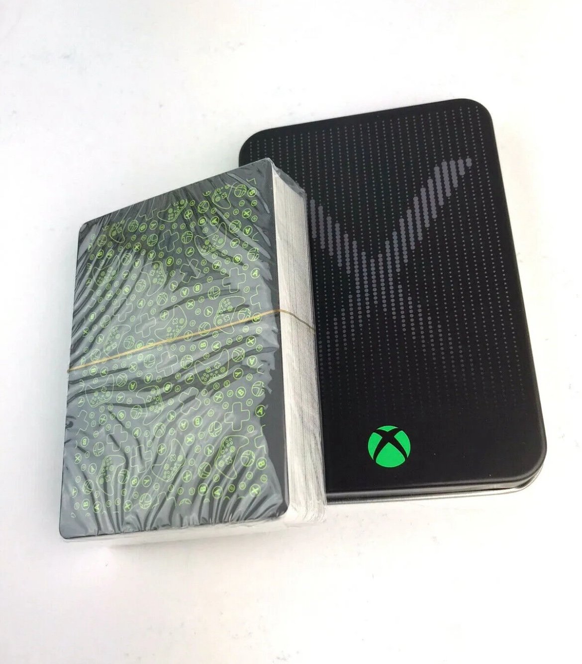 Xbox Playing Cards in a collectible tin, which is designed to resemble an Xbox console. 